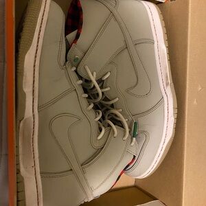 Men’s Nike Red/Black stripped material, grey colored shoes. Size 9.5.